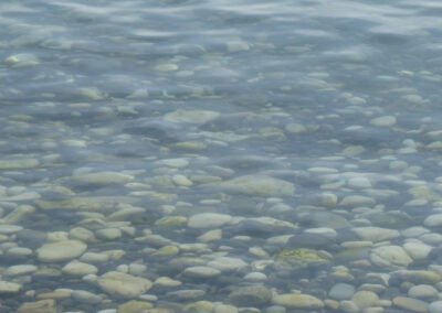 Pebbles under the water.